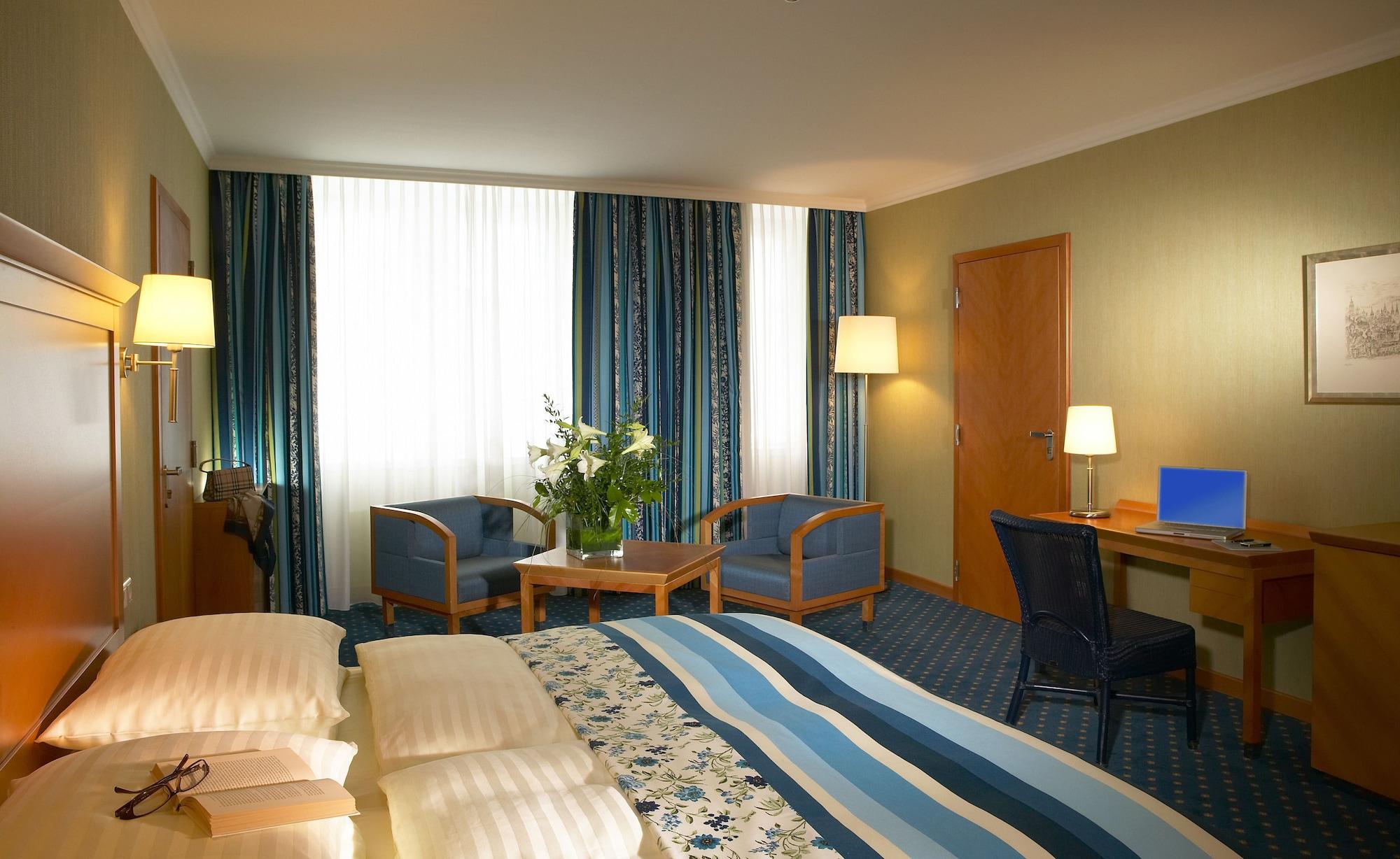 Hotel De France Wien Viena Quarto foto A typical hotel room